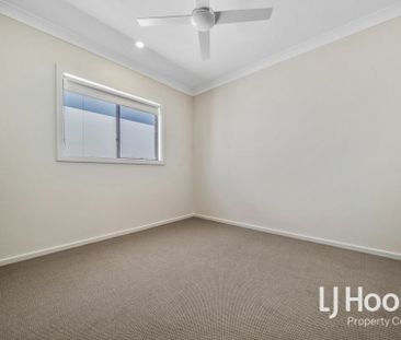 Modern Family Home with Ducted Air Conditioning & Media Room - Photo 4