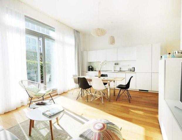 925 | Sonnige Erdgeschosswohnung mit großzügiger Terrasse in zentraler Lage in Mitte - Photo 1