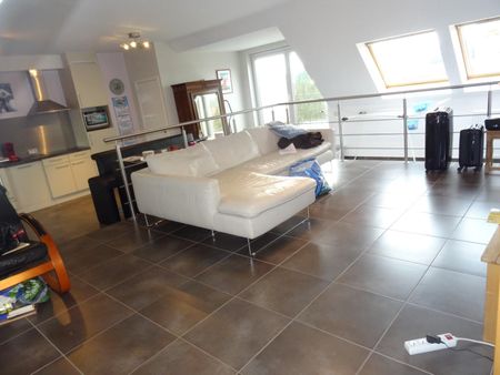 Dakppartement met 2 slaapkamers en groot terras - Photo 2