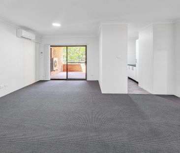 RENOVATED 2 BEDROOM UNIT WITH SPLIT AIR CONDITIONER - Photo 1