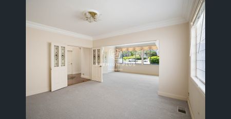 Elevated Family Home with Expansive Living & Leafy Outlook - Photo 5