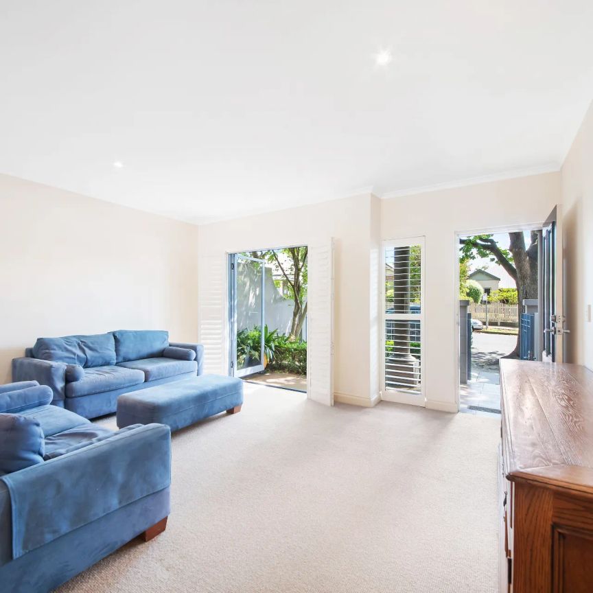 Stylish Terrace-Style Townhouse with Double Garage & Loft Retreat - Photo 1