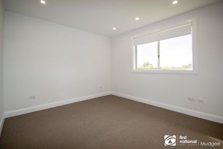BRAND NEW DUPLEX OFFERING SPACE, STYLE & COMFORT - Photo 4