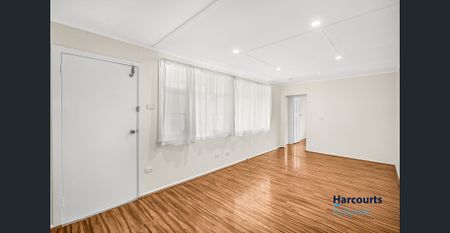 FAMILY HOME - PERFECTLY LOCATED THREE BEDROOM HOME WITH SUNROOM- - Photo 2