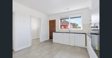 Convenience Meets Comfort in This Three Bedroom Home - Photo 3