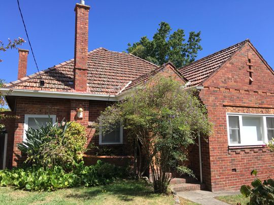 Charming Solid Brick Family Home - Photo 1