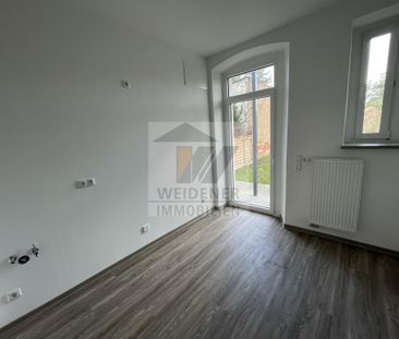 Erstbezug nach Sanierung! 4-Raum-Maisonettewohnung mit Balkon und T... - Photo 2