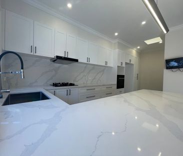Stunning Fully Renovated Single-Level Home in a Prime Location! - Photo 1