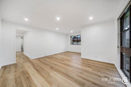 Newly Renovated Family Home in Sought after Bossley Park - Photo 2