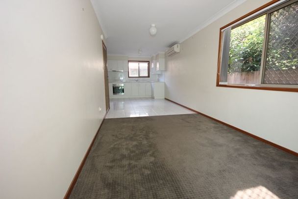 WELL POSITIONED END TOWNHOUSE - Photo 1