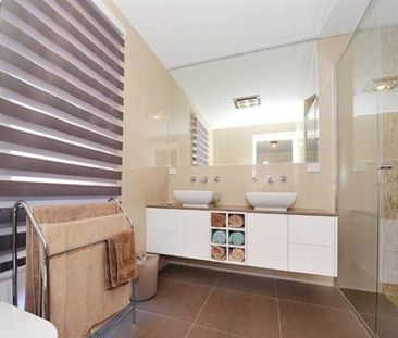 Four bedroom heart- Tranquil Corner Charm Close to Amenities - Photo 1
