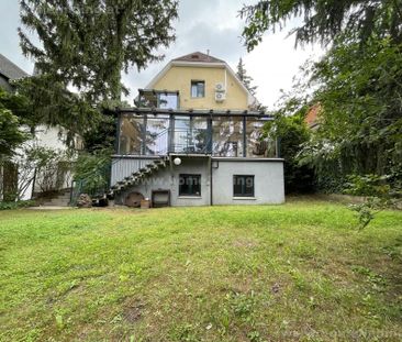 Einfamilienhaus mit schönem Garten nahe Mauer - Photo 1