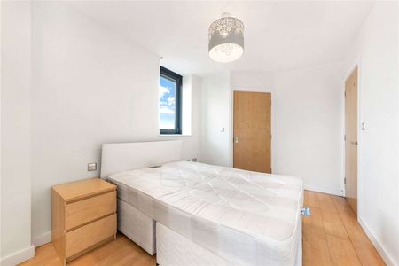 This property is conveniently situated in zone 2, providing excellent transportation connections to central London, with easy access to All Saints DLR station nearby. - Photo 3