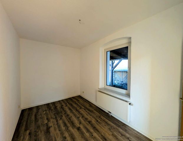 Gemütliche Erdgeschosswohnung mit Einbauküche - Photo 1