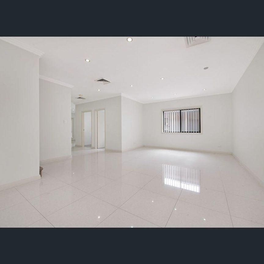 SPACIOUS FREESTANDING FAMILY HOME WITH DOUBLE GARAGE - Photo 1