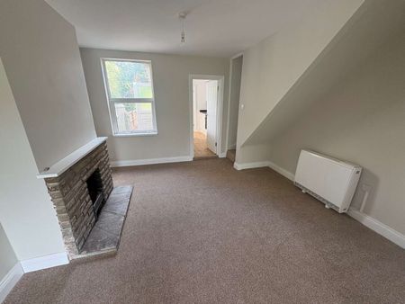 A well-presented two-bedroom home with neutral décor and village setting. - Photo 3
