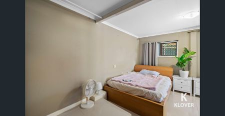 Spacious Home with Dual Living Potential in the Heart of Woodridge - Photo 5