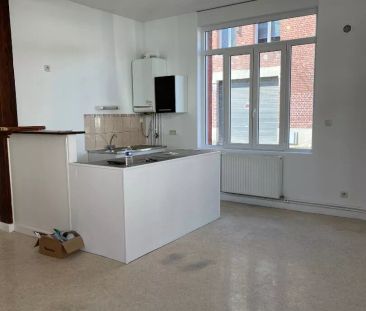 A LOUER APPARTEMENT EN RDC QUARTIER REMICOURT A ST QUENTIN 02100. - Photo 1