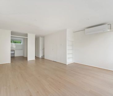 Sun-Filled Modern Townhouse with Stone Kitchen and Private Courtyar... - Photo 2