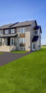 Beau 4 1/2 neuf, demi sous-sol, style semi-détaché ! - Photo 4