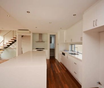 “EXTRAORDINARY TOWNHOUSE LIVING NEARBY THE BEACH” - Photo 5