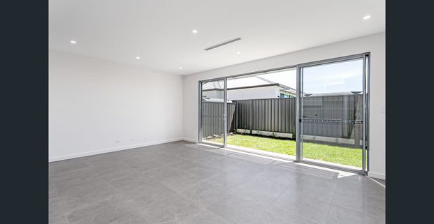 Modern Three bedroom Two Bathroom home in Wanted Locale - Photo 1