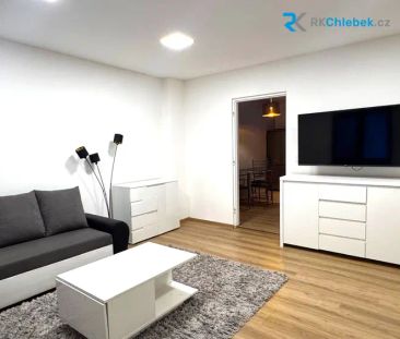 Pronájem bytu 1+1 se zahradou a parkovacím místem - Photo 2