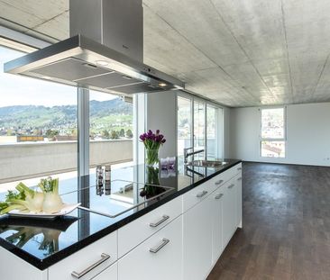 Modern attic apartment is looking forward to you! - Photo 1