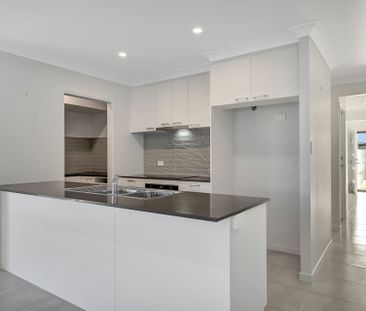 Modern Family Home with Pool in Prime Mount Low Location - Photo 2