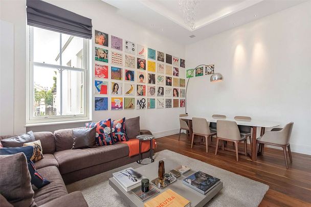 A stunning split-level apartment on Leinster Gardens, featuring two bedrooms and two bathrooms. This property boasts high ceilings and exceptional finish quality throughout. - Photo 1