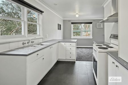 A beautifully renovated four-bedroom home - Photo 4