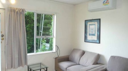 Fully Furnitured one bedroom unit with a carport - Photo 5