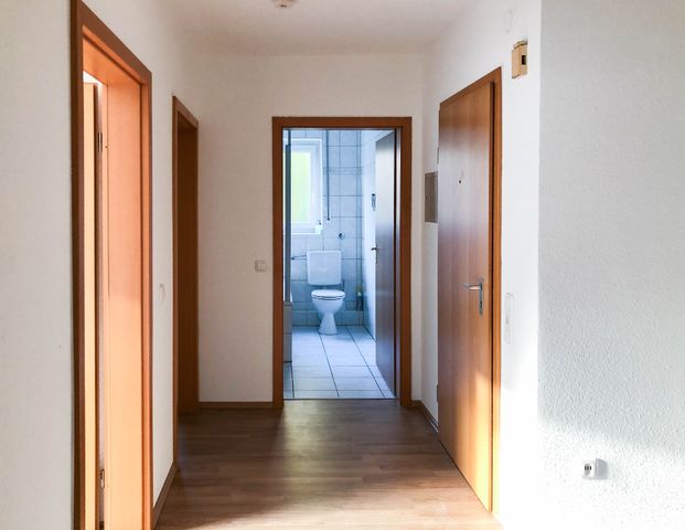 Gut geschnittene EG Wohnung mit Balkon und Garage - Foto 1
