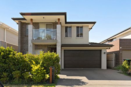 Modern Luxury with Multiple Living Zones & Low-Maintenance Backyard - Photo 5