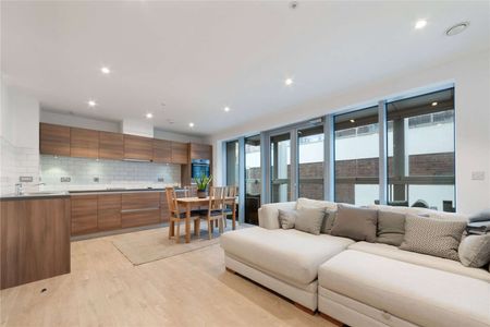 A stunning two bedroom, two bathroom flat located on the first floor of a modern development on Barking Road. - Photo 3