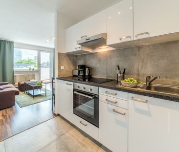 City-Residence: Schick eingerichtete Wohnung mit Skylineblick in se... - Photo 3