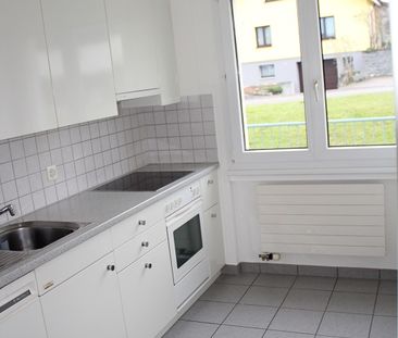 Charmante Wohnung mit Sitzplatz - Foto 3