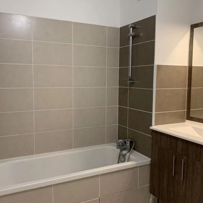 3 pièces de 59 m2 - Photo 1