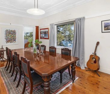 Lovingly Maintained Three Bedroom House with Breathtaking Water Views - Photo 4