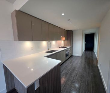 Stylish One Bedroom + Den Residence with Private Balcony - Photo 6