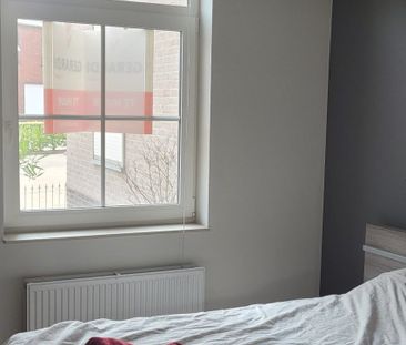 Gezellig energie zuinig gelijkvloers appartement met 1 slaapkamer, ruim terras en ondergrondse staanplaats - Foto 3