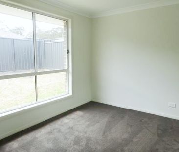 Neat 2-Bedroom Duplex - Water included - Photo 1