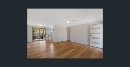 Updated Family Gem with Extra Living Space and Easy-Care Style - Photo 3