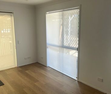 RENOVATED DUPLEX WITH POOL AND TENNIS COURT IN COMPLEX - Photo 1