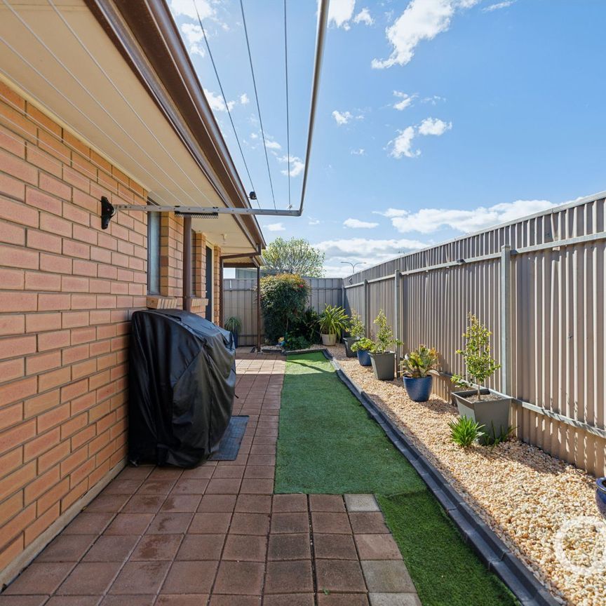 Open the Door to Easy-Care Living with Modern Comfort - Photo 1