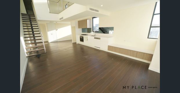 Top floor, oversized split level one bedroom plus study/office room. - Photo 1