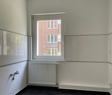 3-Zimmer-Erdgeschosswohnung mit Balkon - Foto 1