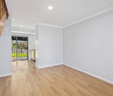 RENOVATED 2 BEDROOM TOWNHOUSE IN PRIME LOCATION! - Photo 1