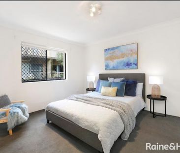 Easy Two-Level Living with Balcony - Photo 4