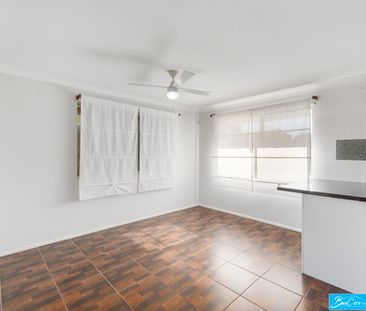 Comfortable Family Living with a Generous Backyard - Photo 5